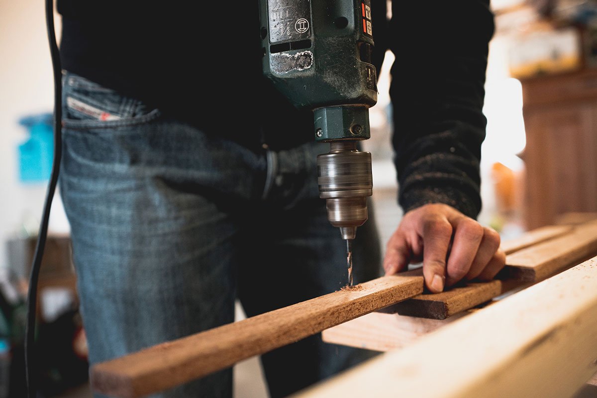 During Demolate Man drilling wood 1